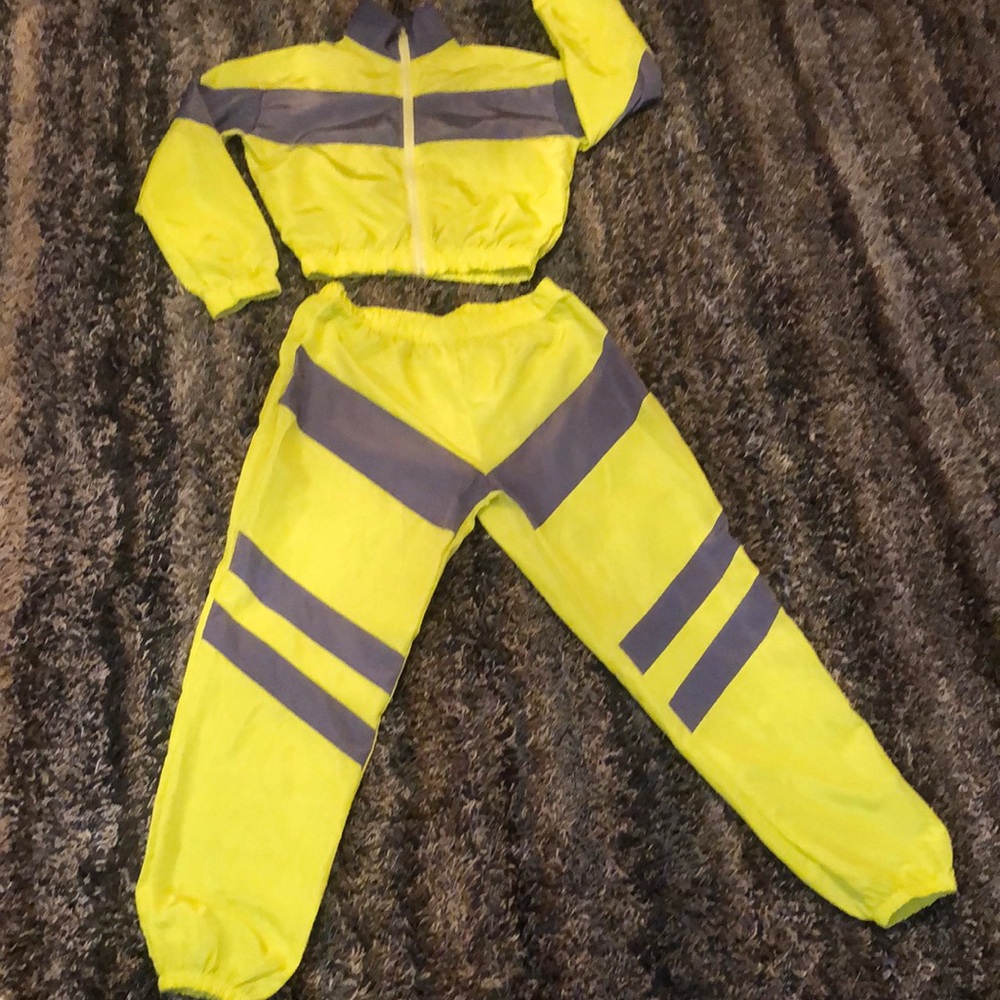 Two piece lime green windbreaker suit